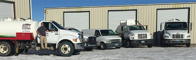 Huff Sanitation photo of 5 service vehicles